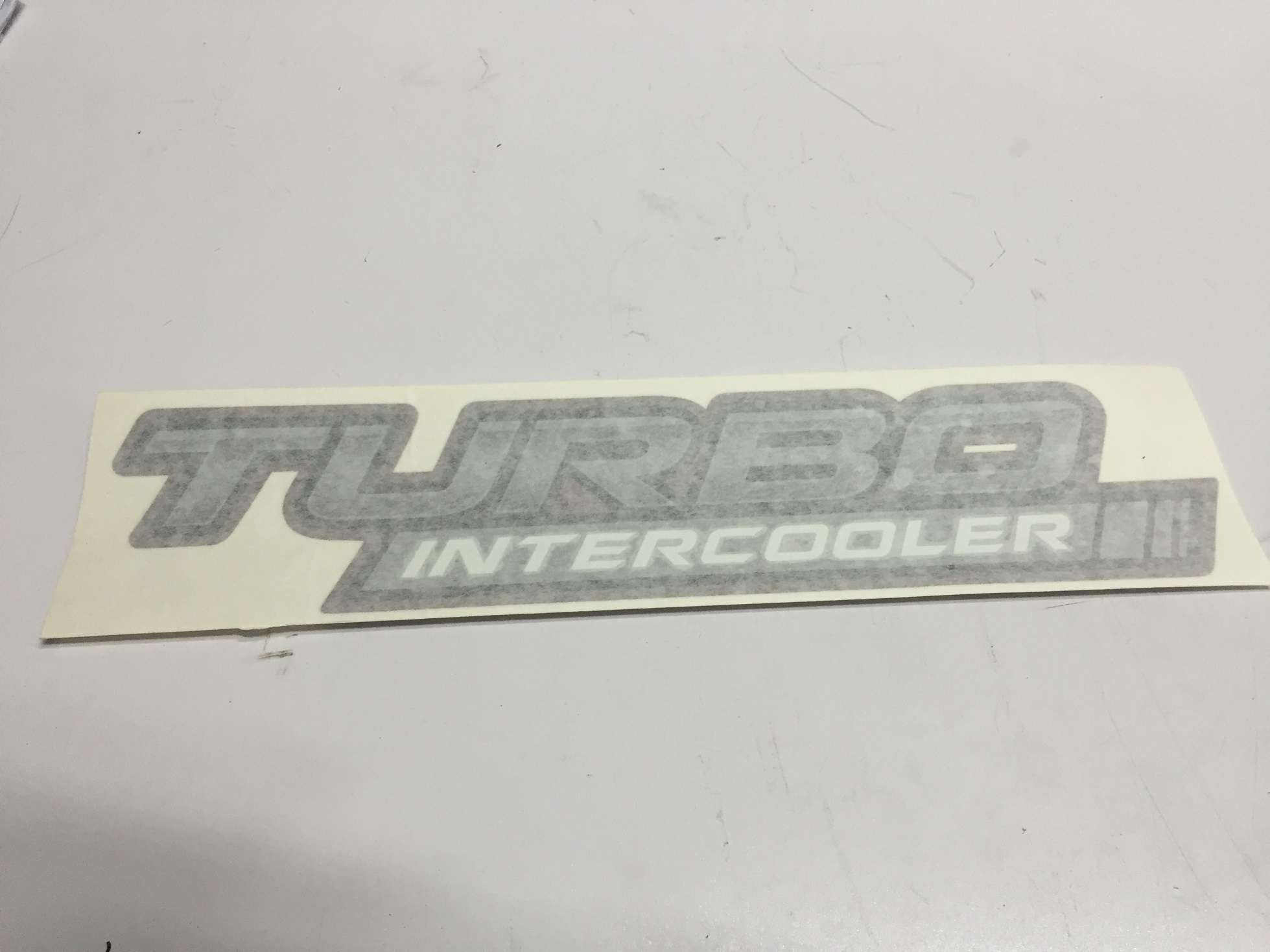 CALCO LATERAL DE CAJA HILUX 2005-2008 (TURBO INTERCOOLER)